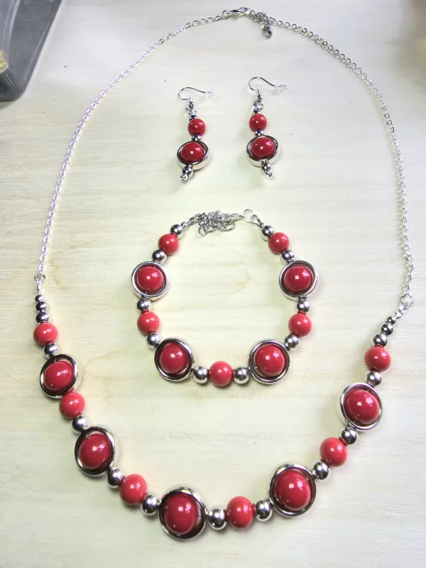 Silver ringed red beaded jewellery set - Necklace, bracelet and earrings.