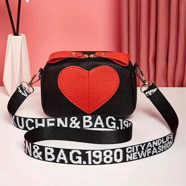 Heart emblem girls handbag