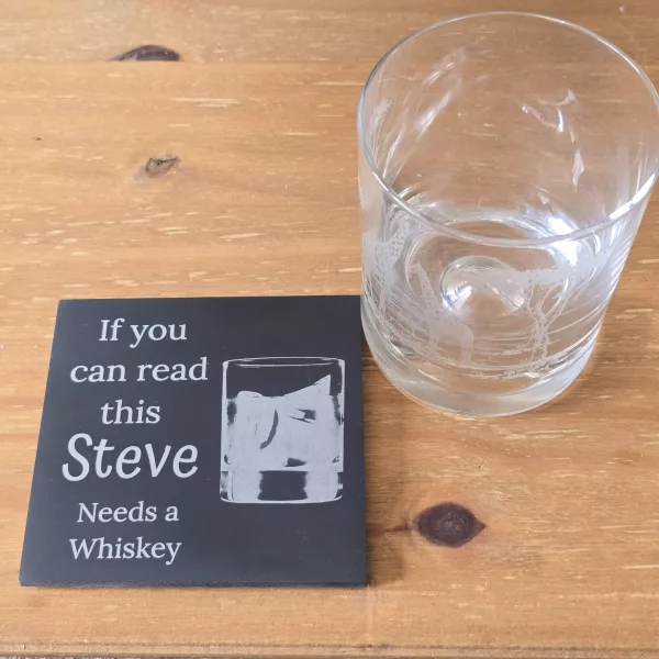 personalised slate coaster with your name needs a whiskey slogan on next to a whiskey glass